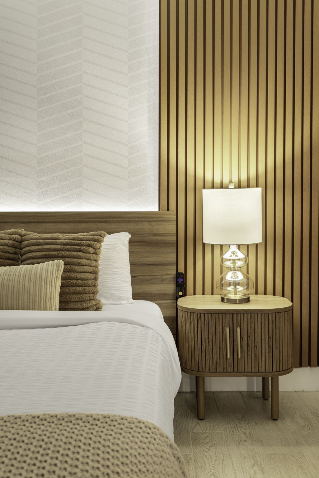Queen bedroom nightstand and wood-slat accent wall