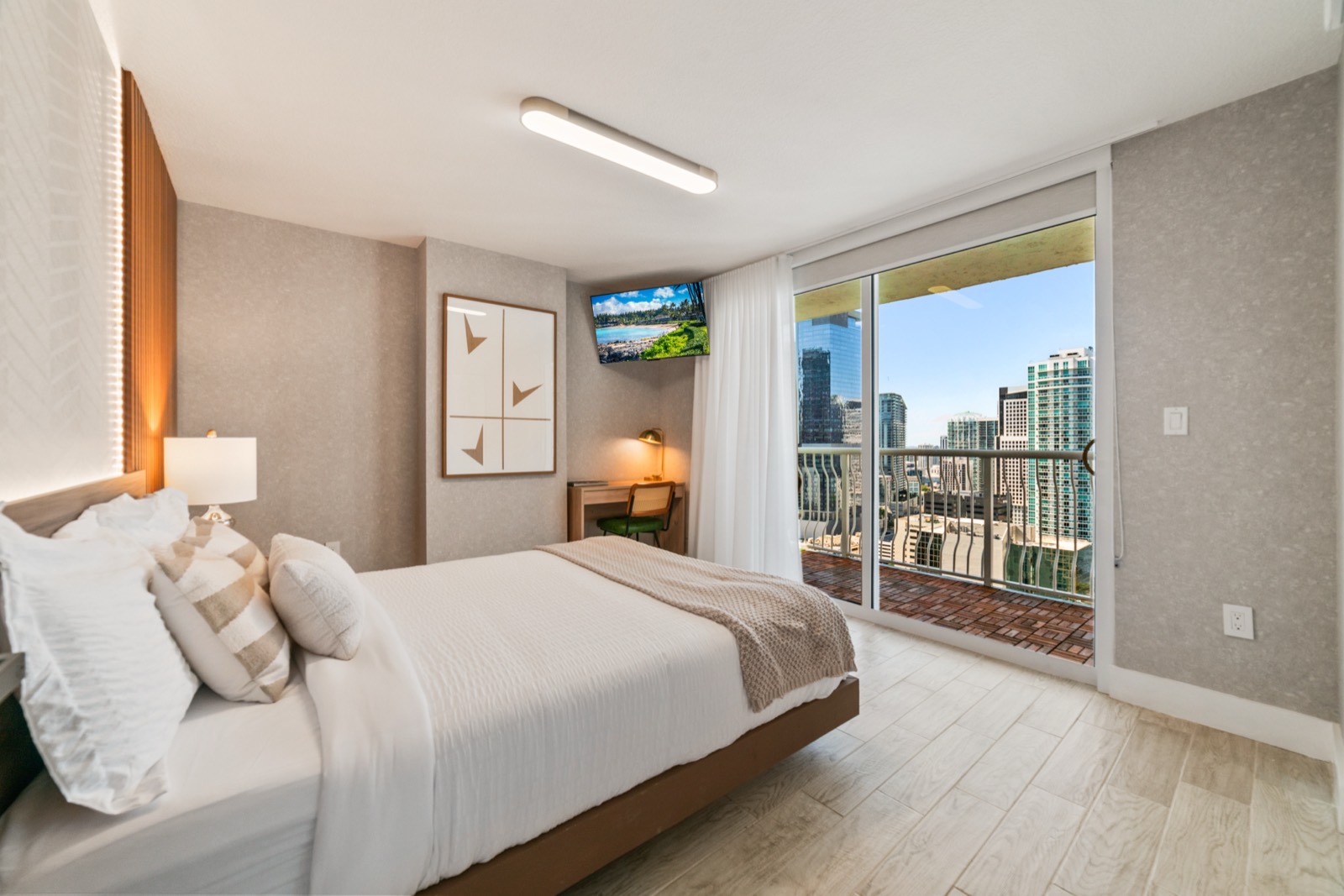 Queen bedroom with city views